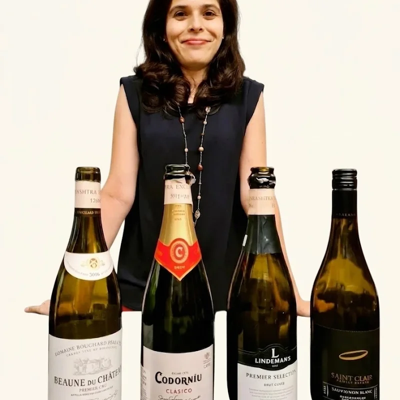 Sovna Puri teaching an in-person WSET wine class
